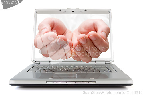 Image of open palms coming out of a laptop