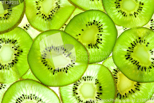 Image of bright background of kiwi slices