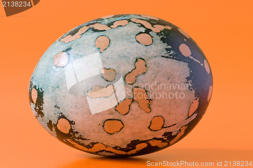 Image of easter egg  on orange background