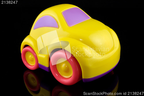 Image of yellow plastic car