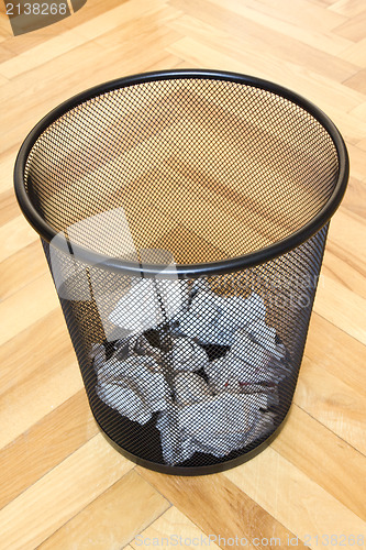 Image of bin with paper waste