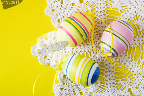Image of colorful easter eggs on white serviette