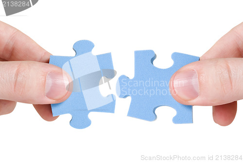 Image of connecting different pieces of puzzle