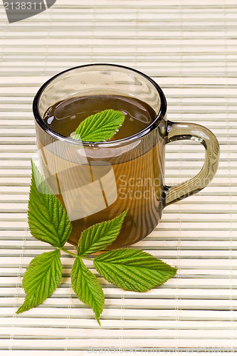 Image of tea and green leaves