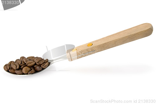 Image of spoon with coffee beans