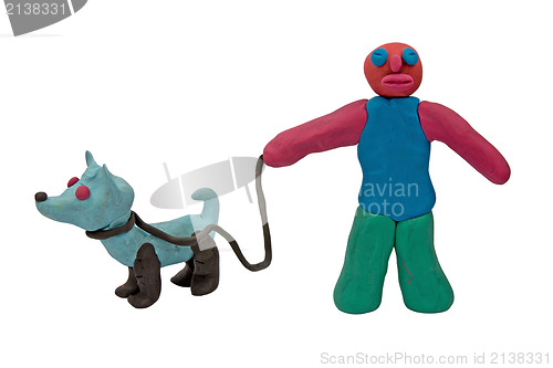 Image of plasticine man with a dog