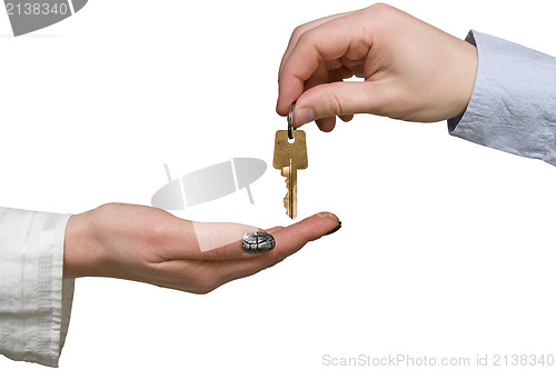 Image of hand giving a golden key to another hand