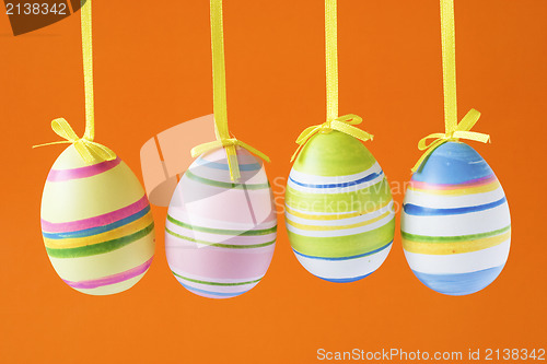 Image of easter eggs isolated on orange background