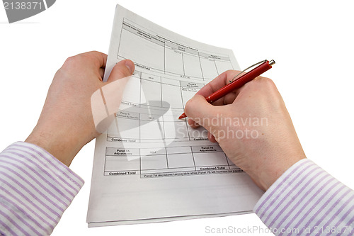 Image of businessman checking tax statement