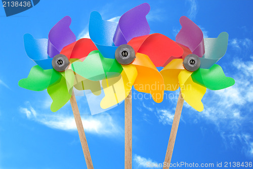 Image of  pinwheel toys against blue sky