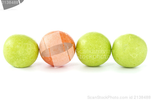 Image of row of  chewing gum balls