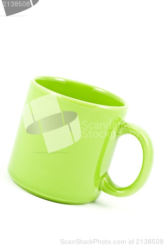 Image of green ceramic cup on white