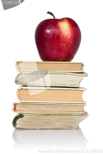 Image of  Stack of books with apple 