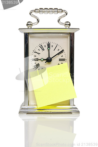 Image of clock with sticky paper