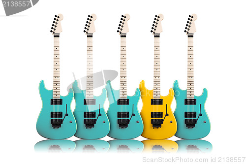 Image of yellow guitar in a middle of blue