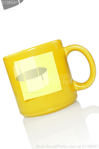 Image of yellow cup with note sticker