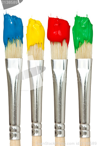 Image of Four paintbrushes with color paints