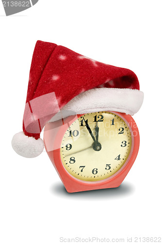 Image of alarm clock in the hat of Santa