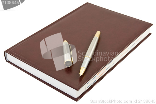 Image of pen and book 