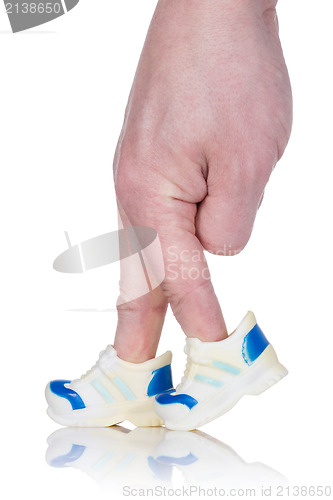 Image of Fingers  wearing sports trainers