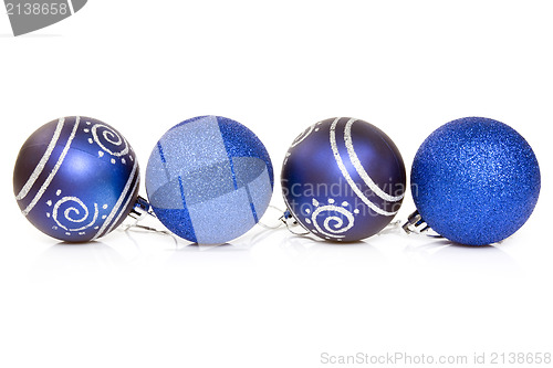 Image of four blue cristmas baubles