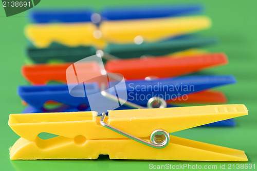 Image of row of colorful clothespins
