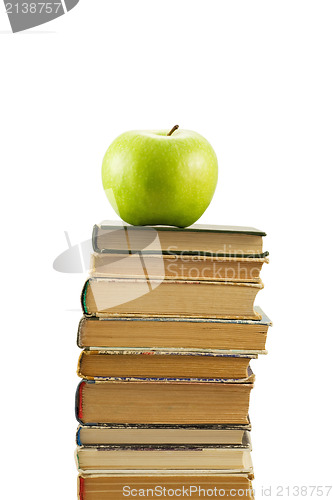 Image of books and green apple