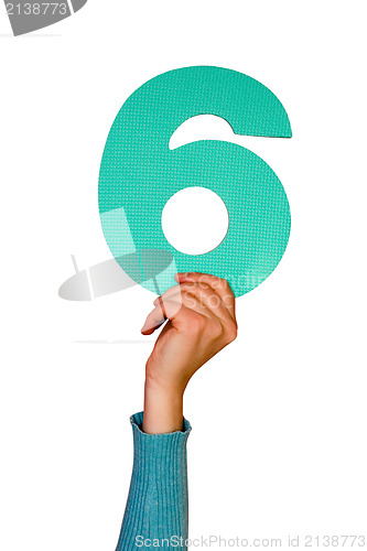 Image of number six in hand