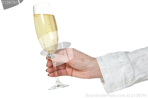 Image of female hand with glass of champagne