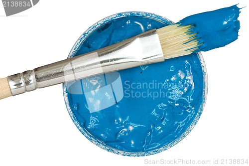Image of Blue paint with paintbrush