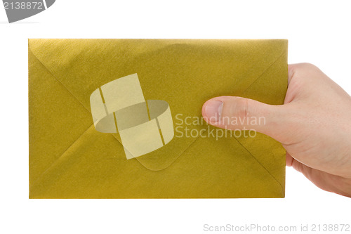 Image of hand with gold envelope