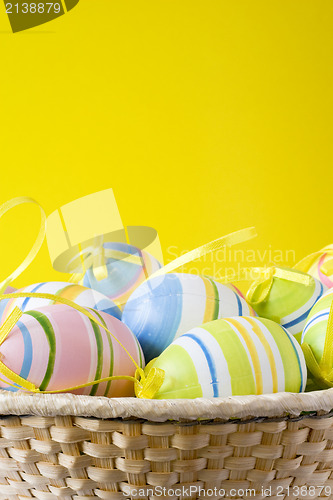 Image of punnet with colorful easter eggs