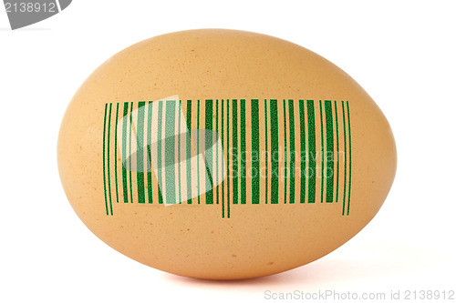 Image of brown egg with green barcode
