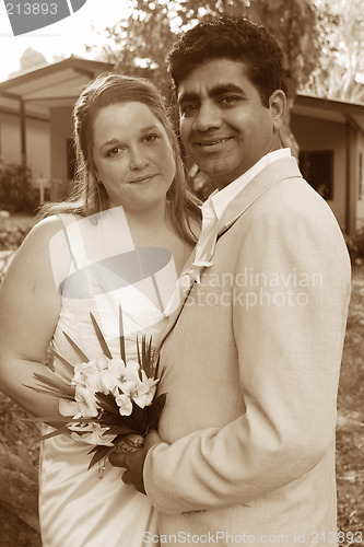 Image of Beautiful bride and groom - sepia toned