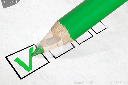 Image of Green pencil marking check box