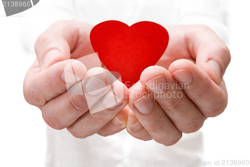 Image of holding a red heart in hands