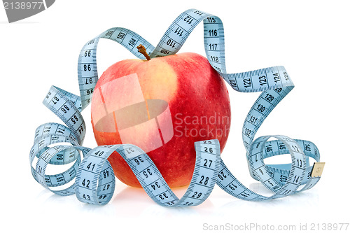 Image of  apple wrapped by blue measure tape