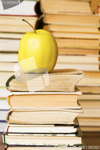 Image of books and apple