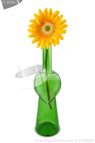 Image of flower in a bottle with heart shape