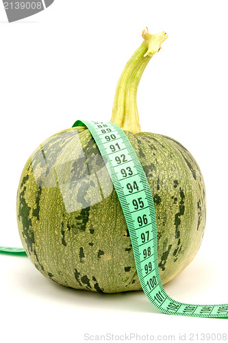 Image of Round zucchini with measuring tape