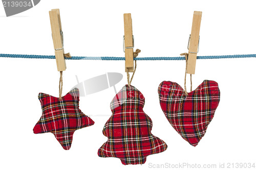 Image of Christmas decorations hang on the clothesline
