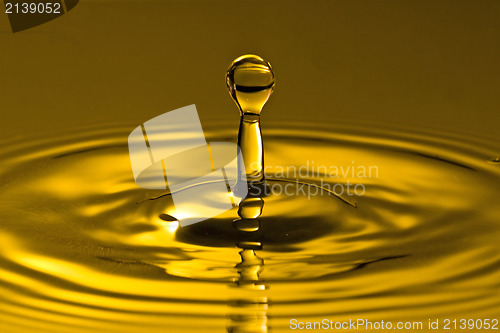 Image of golden water splash