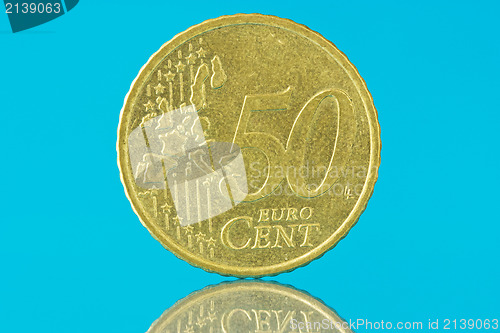 Image of Fifty euro cent on blue background