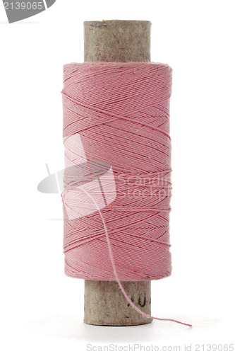 Image of pink bobbin thread