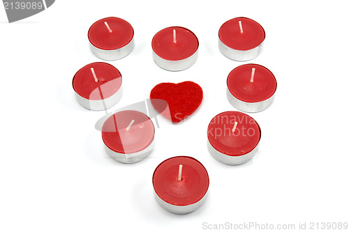 Image of heart shape made from red candles