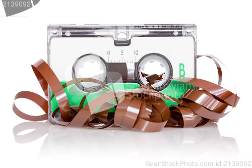 Image of Audio cassette with pulled out tape