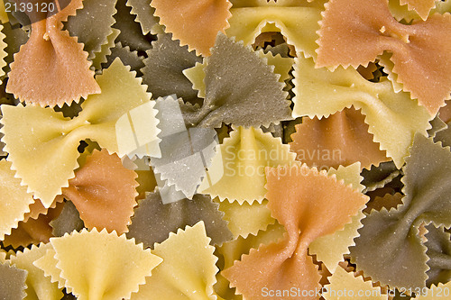 Image of close up of  multi-colored bow pasta