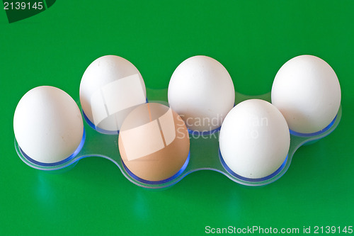 Image of eggs on green background