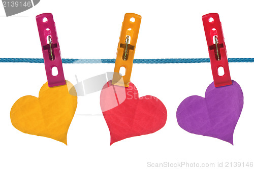 Image of color paper hearts hung on clothesline
