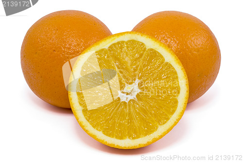 Image of orange fruits over a white background
